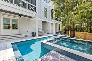 Completed in 2023, this stunning three-story beach house is - photo 10