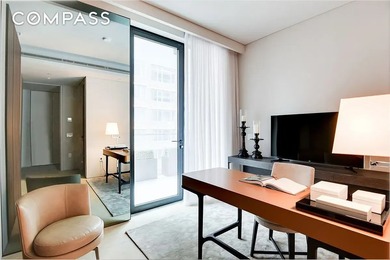 This luxurious 1,255 SF two-bedroom, two-bathroom residence with - photo 4