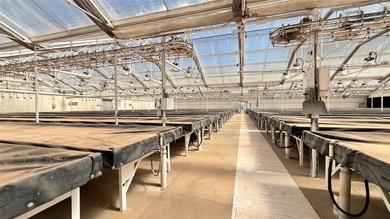 - HIGH-CAPACITY GREENHOUSE FACILITY ON 6 ACRES - This impressive