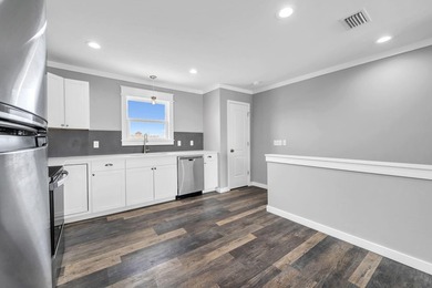Directly across the street from the Gulf, this 2 bedroom, 2 - photo 12