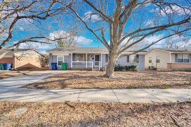 Come home to this peaceful neighborhood located directly across - photo 1