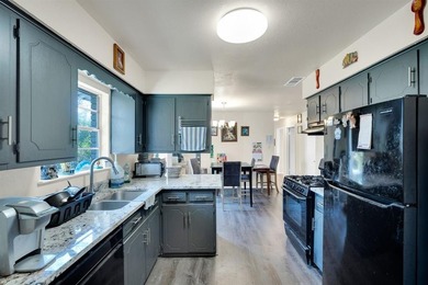 Come home to this peaceful neighborhood located directly across - photo 5