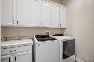 Perched within the prestigious gated community of Laughlin Ranch - photo 54