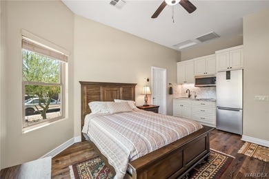 Perched within the prestigious gated community of Laughlin Ranch - photo 57
