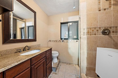 Experience refined coastal living in this beautifully renovated - photo 12