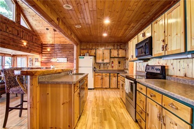 Enjoy Panoramic views from this 4 BD 3BA Lake Home with 4 Car - photo 6