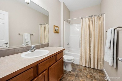 Welcome home to Evergreen Heights! Meticulously maintained and - photo 6