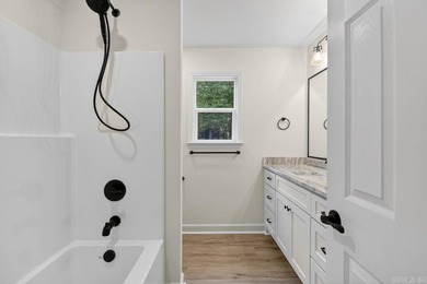 WOW! New Construction! Very pretty white siding w/white brick! - photo 13