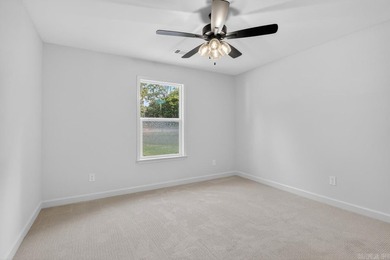 WOW! New Construction! Very pretty white siding w/white brick! - photo 14