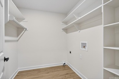 WOW! New Construction! Very pretty white siding w/white brick! - photo 16