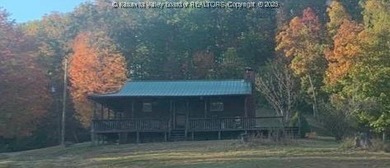 Escape to your own private 15.66-acre mountaintop retreat in - photo 16