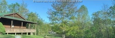 Escape to your own private 15.66-acre mountaintop retreat in - photo 17