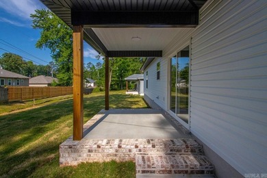 WOW! New Construction! Very pretty white siding w/white brick! - photo 24