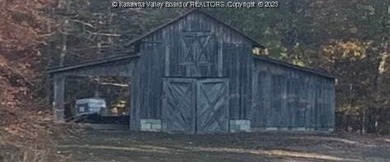 Escape to your own private 15.66-acre mountaintop retreat in - photo 24