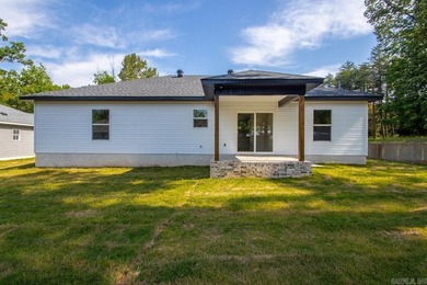 WOW! New Construction! Very pretty white siding w/white brick! - photo 27