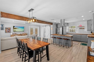 A bright, open living space, a backyard built for hosting, and a - photo 8