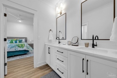Welcome to this immaculate two-story coastal retreat in the - photo 22