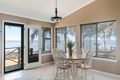 This amazing bay front home gives the feeling of being out in - photo 1
