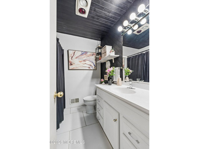 Expanded 3 BR, 2 full BA ranch in desirable Lake Riviera - photo 22