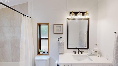 Tucked into a peaceful, wooded setting, this restored 2-bedroom - photo 13