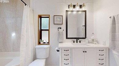 Tucked into a peaceful, wooded setting, this restored 2-bedroom - photo 14