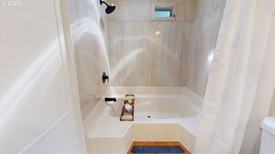 Tucked into a peaceful, wooded setting, this restored 2-bedroom - photo 15