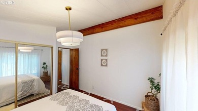 Tucked into a peaceful, wooded setting, this restored 2-bedroom - photo 17