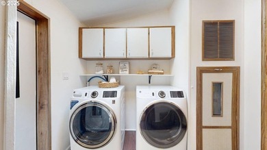 Tucked into a peaceful, wooded setting, this restored 2-bedroom - photo 20