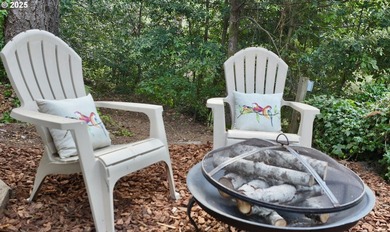 Tucked into a peaceful, wooded setting, this restored 2-bedroom - photo 24