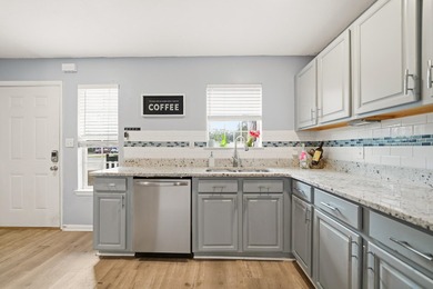 Step into this gorgeous, fully furnished townhome where coastal - photo 2