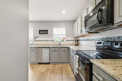 Step into this gorgeous, fully furnished townhome where coastal - photo 4