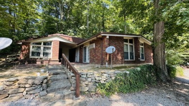 A quaint rough river cottage sitting on 3 lake lots! Call Josh! - Lake Home For Sale in Leitchfield, Kentucky