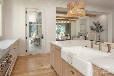 Nestled on nearly half an acre in the heart of prestigious Myers