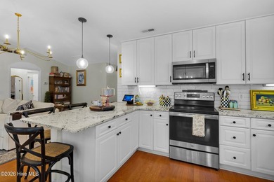 Welcome to this well-maintained three-bedroom home with a - photo 13