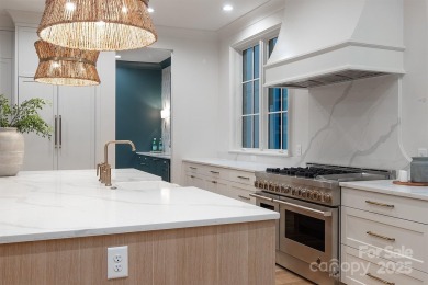 Nestled on nearly half an acre in the heart of prestigious Myers