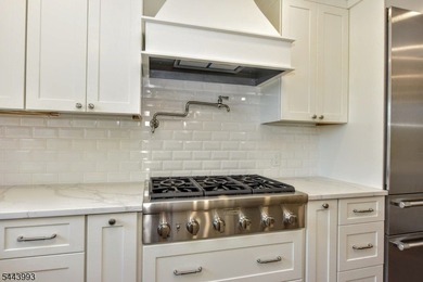 Lake Mohawk living, reimagined & transformed from approximately - photo 14