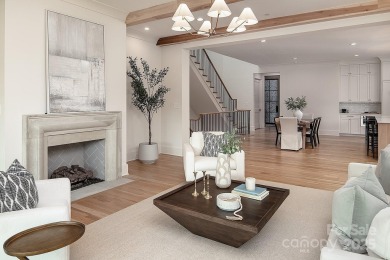 Nestled on nearly half an acre in the heart of prestigious Myers