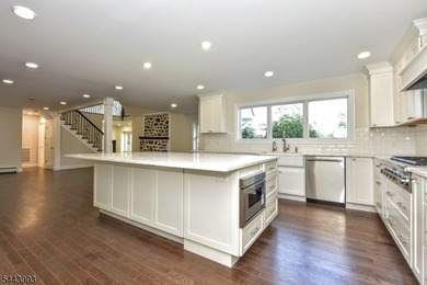 Lake Mohawk living, reimagined & transformed from approximately - photo 16