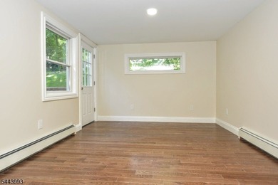 Lake Mohawk living, reimagined & transformed from approximately - photo 22