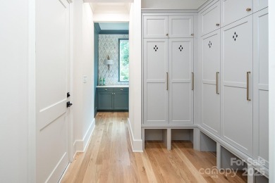 Nestled on nearly half an acre in the heart of prestigious Myers