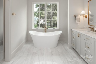 Nestled on nearly half an acre in the heart of prestigious Myers