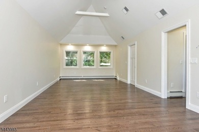 Lake Mohawk living, reimagined & transformed from approximately - photo 31