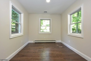Lake Mohawk living, reimagined & transformed from approximately - photo 35