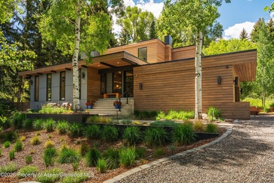 Nestled on a private one-acre parcel, this beautifully renovated - photo 1