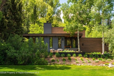 Nestled on a private one-acre parcel, this beautifully renovated - photo 2