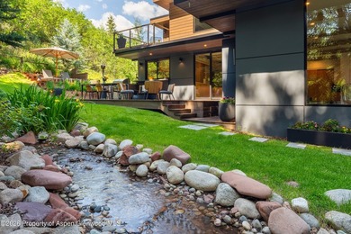Nestled on a private one-acre parcel, this beautifully renovated - photo 3