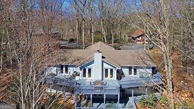 This adorable 4-bedroom, 4.5-bathroom mountain cabin is located - photo 1
