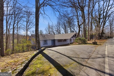 This adorable 4-bedroom, 4.5-bathroom mountain cabin is located - photo 8