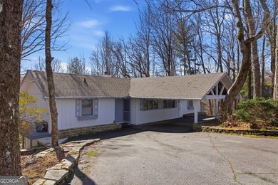 This adorable 4-bedroom, 4.5-bathroom mountain cabin is located - photo 9