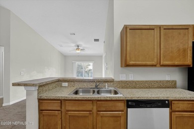 Bright and move-in ready second-floor condo in desirable Woods - photo 11